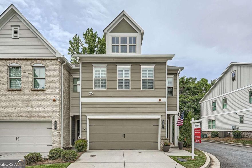 Don't miss out on this beautiful move-in ready townhome in the North Square Community. Located just off Historic Marietta Square, this end-unit home offers an abundance of natural light, hardwood floors throughout the main level, recessed lighting and crown modeling. The kitchen features beautiful quartz countertops, stainless steel appliances, custom cabinets, a large kitchen island, walk-in pantry and an open view to the spacious living and dining room which is great when entertaining family and friends! A wide staircase with wrought iron spindles leads to the upstairs, featuring hardwood floors and long hallway. Upstairs is the large primary bedroom with a sprawling walk-in closet and a spacious primary bathroom with his/her vanity. The home has 2 additional large bedrooms with walk-closets. There are plantation shutters through out the home for a classic feel. North Square has great neighborhood amenities that include a resort-style pool with a firepit, cabana, a large dog park and extensive green space. Close to Marietta Square, vast restaurants, enjoy an evening concert or one of the many arts festivals and events throughout the year. Conveniently located to near WellStar Kennestone Hospital and medical district, easy access to the interstate, shopping, and Kennesaw Mountain National Battlefield along the 23 miles of hiking trails it offers.