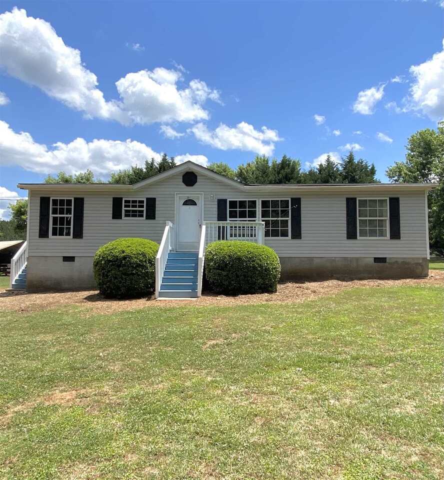 Country living at its finest! Make this property your next home with its beauty and serenity. Secluded and private fenced-in yard with tree-lined perimeter, wooded grounds. Outdoor living with custom horseshoe pits, fire pits, and chicken coop. Enjoy the gardens with blueberry and blackberry bushes. Perfect for the gardeners and farmers alike! Inside this 3 bed/2bath home with new luxury vinyl flooring, newer water heater, HVAC and new roof! The master offers a stand-up shower and garden tub. Nice size secondary bedrooms and spacious living room, with eat-in kitchen, and separate laundry room. NO HOA! Convenient to Athens, Commerce, 78 and 316. HIGHEST and BEST by Monday, June 7th.