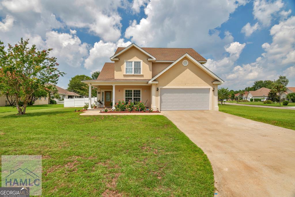 Beautiful Stucco home located Lexington Place!!! Plenty of room in this 4 bedroom, 3.5 bath home on corner lot Features include great rm.w/FP kitchen has appliances, breakfast area, spacious dining room, dbl. garage, fenced in backyard w/patio, laundry rm.,floors are hardwood & tile. Convenient to dining, shopping, schools, churches, activities & I-95