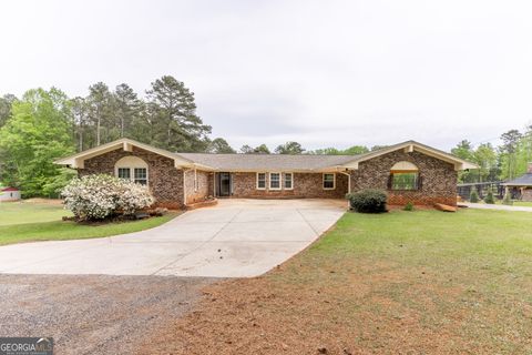 Photo of 938 Swan Lake Road, Stockbridge, GA 30281 (MLS # 10727205)