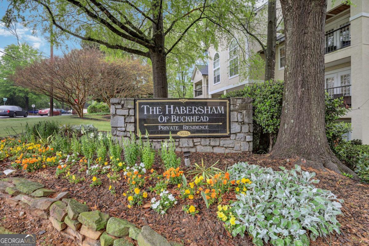 Enjoy luxury living in the heart of Buckhead in one of only two-story units in the Habersham of Buckhead Condos! This is a rare condo that has the full living area on the 2nd floor, complete with a discreet murphy bed in the corner, with the an oversized primary bedroom all on the lower level. Comes with TWO deeded parking spots and ONE deeded storage unit! This home is great for enjoying both the peacefulness of the building and the vibrant city life; a completely open-floor plan on the main level with hardwood floors throughout. Upgraded kitchen with sleek black appliances - including the microwave, oven, stove, dishwasher and refrigerator - coupled with a large countertop space that is sure to impress any home chef. Plenty of windows with blinds. Check out the hidden murphy day bed tucked away in the wooden cabinet to have complete first level condo living, with a full bath! Spacious primary bedroom with a separate bathroom with the laundry on the lower level, or use as a media room, office - the options are endless. Rarely does a 1 bedroom come complete with two designated, separate parking spaces and a separate storage unit to make it easy for the whole family! The building has all amenities with plenty of options for relaxation and entertainment. Next to Phipps, Lenox, Publix, Target & Marta & others - truly live in heart of Buckhead with quick access to everything!