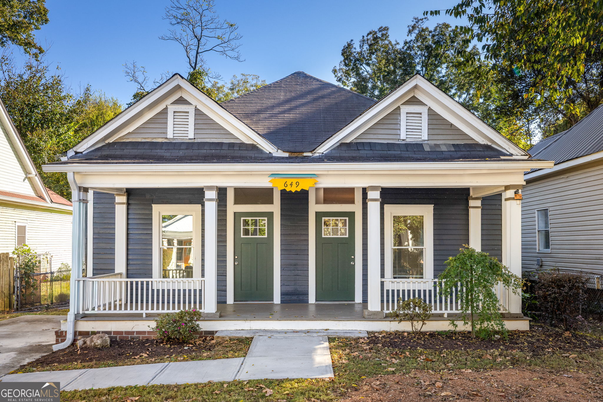 649 Woodward Avenue, North Grant Park Gem! Welcome to this classic 1920s Craftsman bungalow in one of Grant Park's most coveted, walkable pockets. Tucked on a quiet street yet moments from Cabbagetown, the BeltLine, and every retail and dining option north of I-20, a 10 out of 10 for location. Enjoy easy access to I-75, I-85, and I-20, plus a short stroll to Grant Park itself. Inside, timeless character meets thoughtful updates. Solid hardwood floors, high ceilings, and abundant natural light create a warm, open feel. The modern, functional floor plan offers oversized bedrooms, a spacious primary suite with an impressive bathroom and closet, and beautiful flow throughout. The living space has a living room and dining room and a bonus full eat in kitchen. Outdoor living shines with a classic front porch and a newly added vaulted screened porch that flows seamlessly from the eat in kitchen that expands your living space and invites year-round enjoyment and space to truly entertain. The level, deep backyard offers endless potential for gardens or future expansion. This is the perfect blend of historic charm, modern comfort, and unbeatable location.