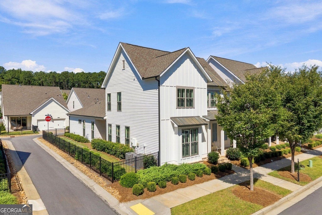 Photo of 1043 Harvest Park Lane, Suwanee, GA 30024 (MLS # 10854328)