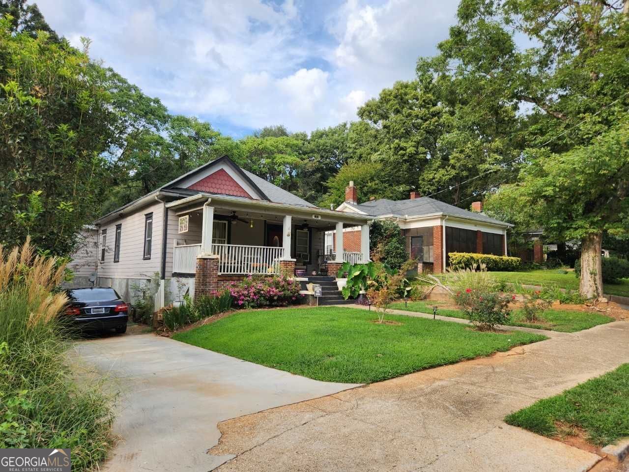Own a piece of history in booming East Atlanta. This charming 3BR/2BA 1910 cottage sits on a spacious lot and is ready for your renovations. Front porch, fenced backyard, hardwood floors, 3BR/2BA with large master suite, total electric. Steps away from East Atlanta Village where restaurants, shops, library and MARTA await. Only 15 minutes to downtown Atlanta via I-20 and 12 miles to Hartsfield-Jackson Airport. Incredible opportunity in one of Atlanta's most desirable, rapidly developing neighborhoods. SOLD AS-IS and priced accordingly.