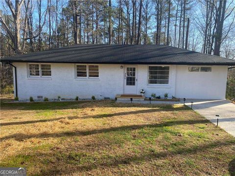 Photo of 4030 Stonewall Tell Road, Atlanta, GA 30349 (MLS # 10659034)