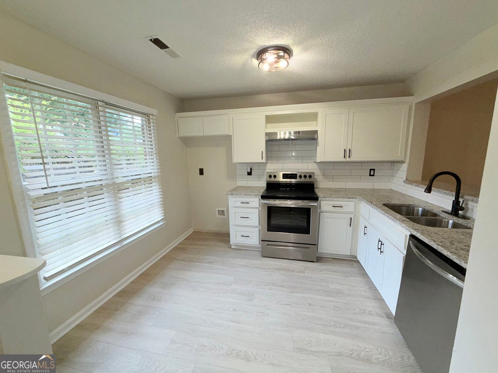 Photo of 1665 Winchester Way SE, Conyers, GA 30013 (MLS # 10825721)