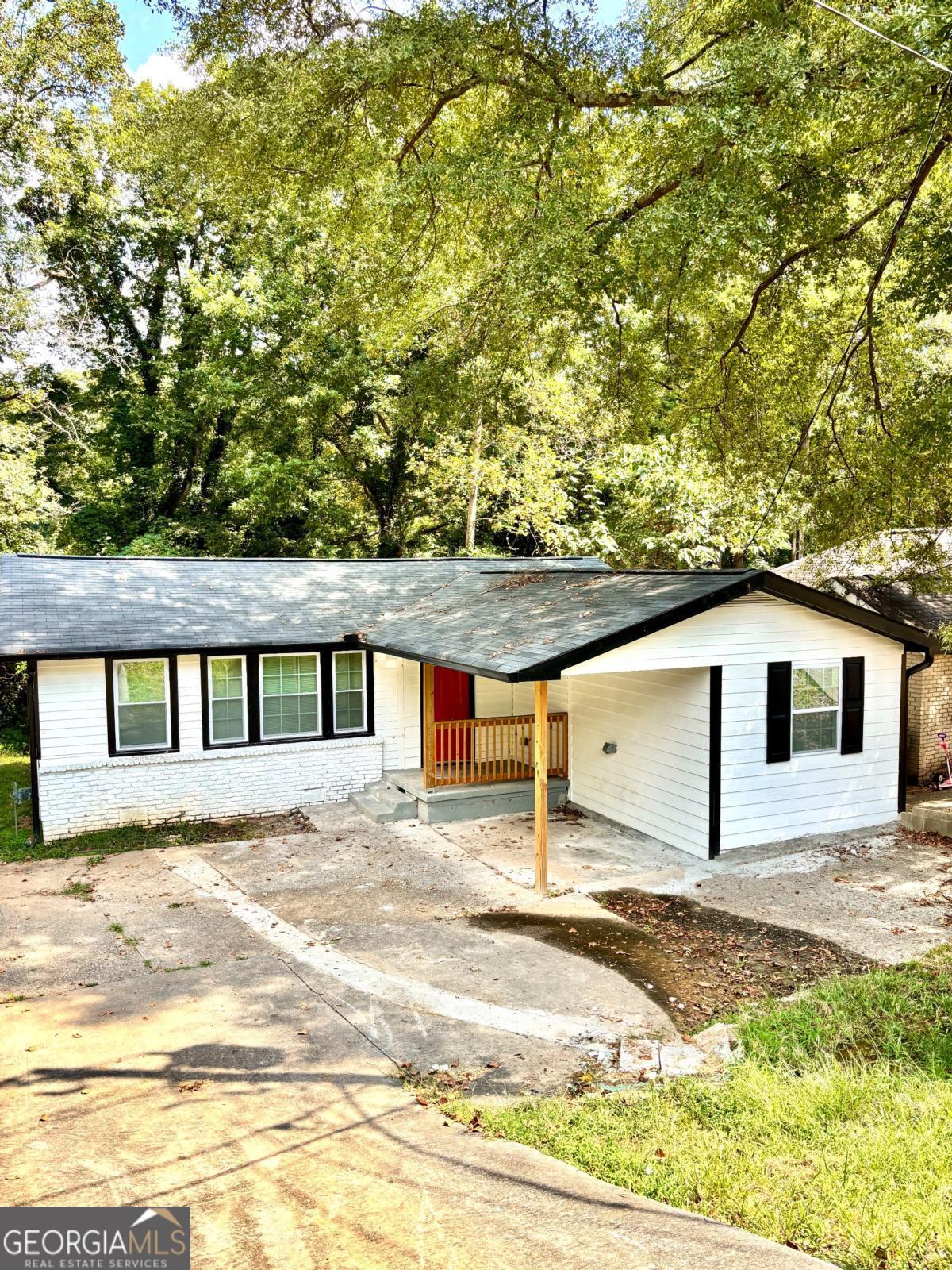 Welcome to 2571 Elliott Street, Atlanta, GA Looking for your dream home or the perfect investment? This fully renovated 3-bedroom, 2-bath ranch offers both! Whether you're a first-time homebuyer seeking a modern, move-in ready space or an investor searching for a high-demand rental property, this home checks all the boxes. Step inside to find an open-concept layout with new luxury flooring, fresh paint, and plenty of natural light. The designer kitchen boasts granite countertops, stainless steel appliances, shaker cabinets, and a spacious island that's perfect for entertaining or family gatherings. Both bathrooms have been completely updated with modern tile designs and new fixtures, adding a touch of elegance. The exterior features fresh siding and paint, giving the home great curb appeal, while the extended driveway offers ample parking. *Why Buyers Love It: Move-in ready, stylish finishes, and the convenience of a modern home without the hassle of renovations. *Why Investors Love It: With full updates and prime location, this property is ready to generate income immediately-especially appealing for those tapping into Atlanta's strong Section 8 market. Ideally located near schools, shopping, and major highways, this property offers accessibility, comfort, and value. Don't miss this rare opportunity! Whether you're buying to live or buying to invest, this home is the perfect fit!