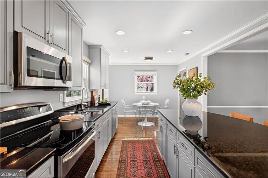 Photo of 6590 Williamson Drive, Atlanta, GA 30328 (MLS # 10657264)