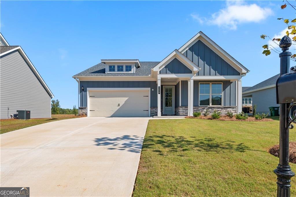 **Beautiful 3BR/2.5BA Ranch (our FRANKLIN plan) in Golf Course Community Open Concept, Large Kitchen Island, LVP Flooring** Don't miss this 3-bedroom, 2.5-bath ranch located in a desirable golf course community. This home features an open-concept layout with 13' ceilings with a spacious kitchen and living area perfect for entertaining. The kitchen includes a large center island, abundant cabinetry, stainless steel appliances and modern finishes. Luxury vinyl plank (LVP) flooring runs throughout the main living spaces, offering durability and style. The primary suite includes a private en-suite bathroom, while two additional bedrooms share a full bath and a convenient half bath for guests. Enjoy outdoor living on the covered back patio, ideal for relaxing or hosting. This home offers single-level living with community access to golf, Jr. Olympic swimming pool and bar, pickleball and tennis courts, restaurant and state of the art golf training center. Key Features: 3 Bedrooms 2.5 Bathrooms *Open Concept Floor Plan *Large Kitchen Island *LVP Flooring Throughout Main Areas *Covered Back Patio *Located in Golf Course Community Ideal for buyers looking for comfort, style, and community amenities. Schedule your showing today! **Interior Stock Photos being used***