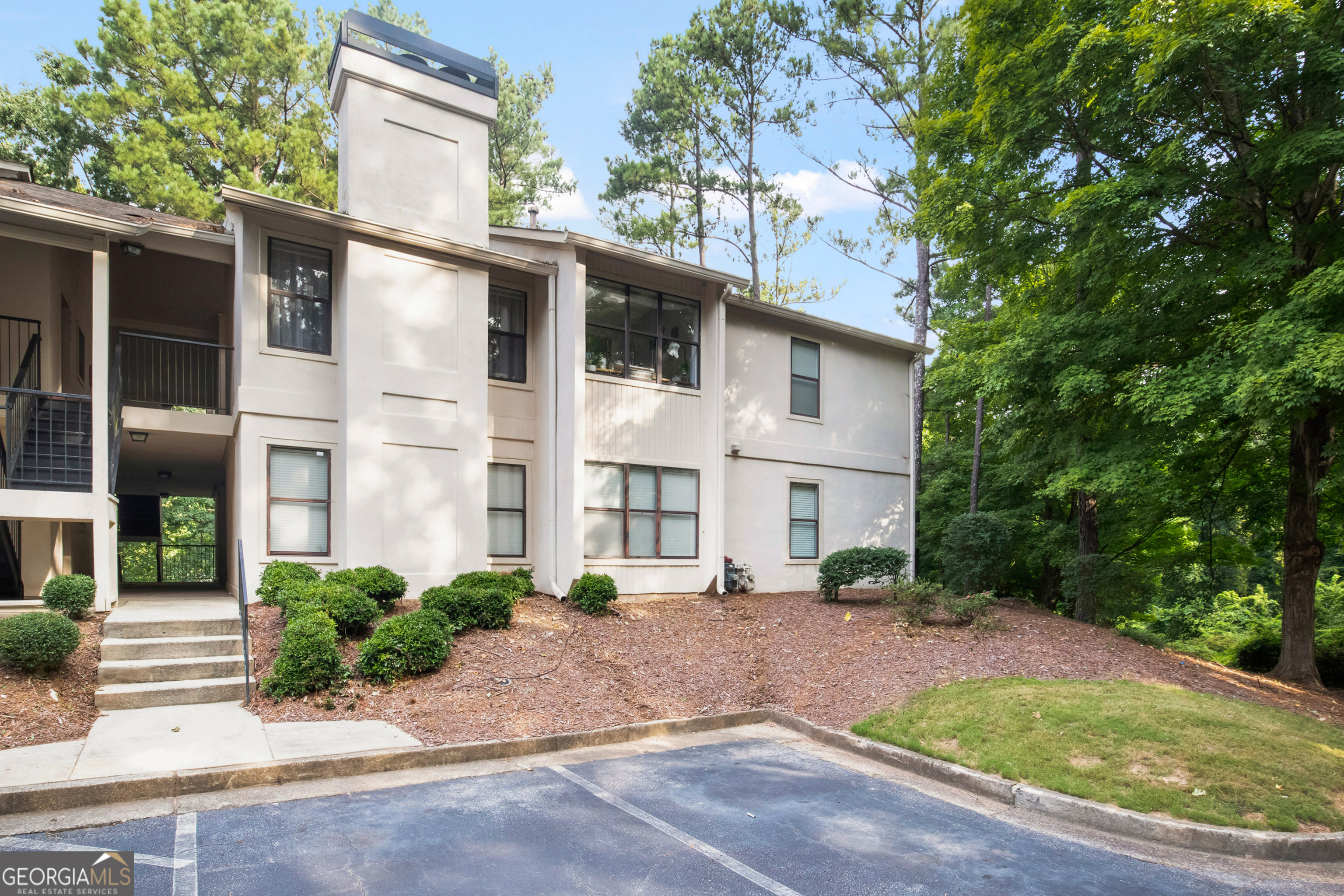 Welcome Home to this spacious 2 BRM/2 BA updated condo, located in the highly desirable Brandon Mill Farms community in Sandy Springs! This move-in-ready home is one of the nicest in the community! Unit is located on the first floor, overlooking the pool, in a very private location, has fresh paint and new LVP designer floors throughout! The home is flooded with natural light, backing up to a large green space for dog walking and relaxing, with a beautiful tree-lined view. This home boasts an updated full kitchen with Modern kitchen cabinetry, plenty of counter space and storage. Open floor plan for easy entertaining, with seamless flow between living spaces, creating a cozy and comfortable setting to spend time with family and friends. A roomy bathroom includes a tub/shower combination and privacy! Hall laundry closet for a full size washer and dryer and storage! This enchanting private community offers walkability, is pet-friendly, has a community lake, swim/tennis, and has ample parking for guests! Close to everything... Schools, Shopping, Dining, North Springs Marta, and minutes to Northridge/GA-400! Trifecta convenience to Sandy Springs, Dunwoody, and Old Roswell!