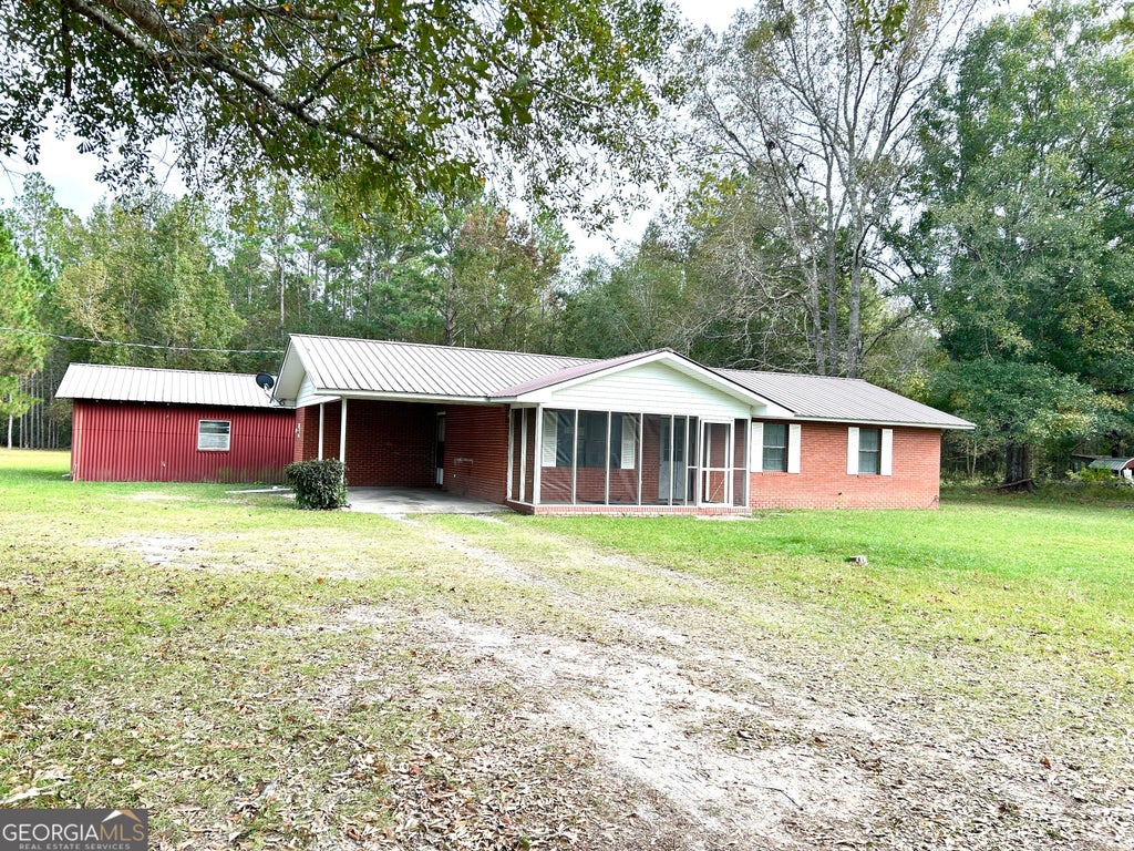 Photo of 7008 White Bluff Rd, Glennville, GA 30427 (MLS # 10882402)