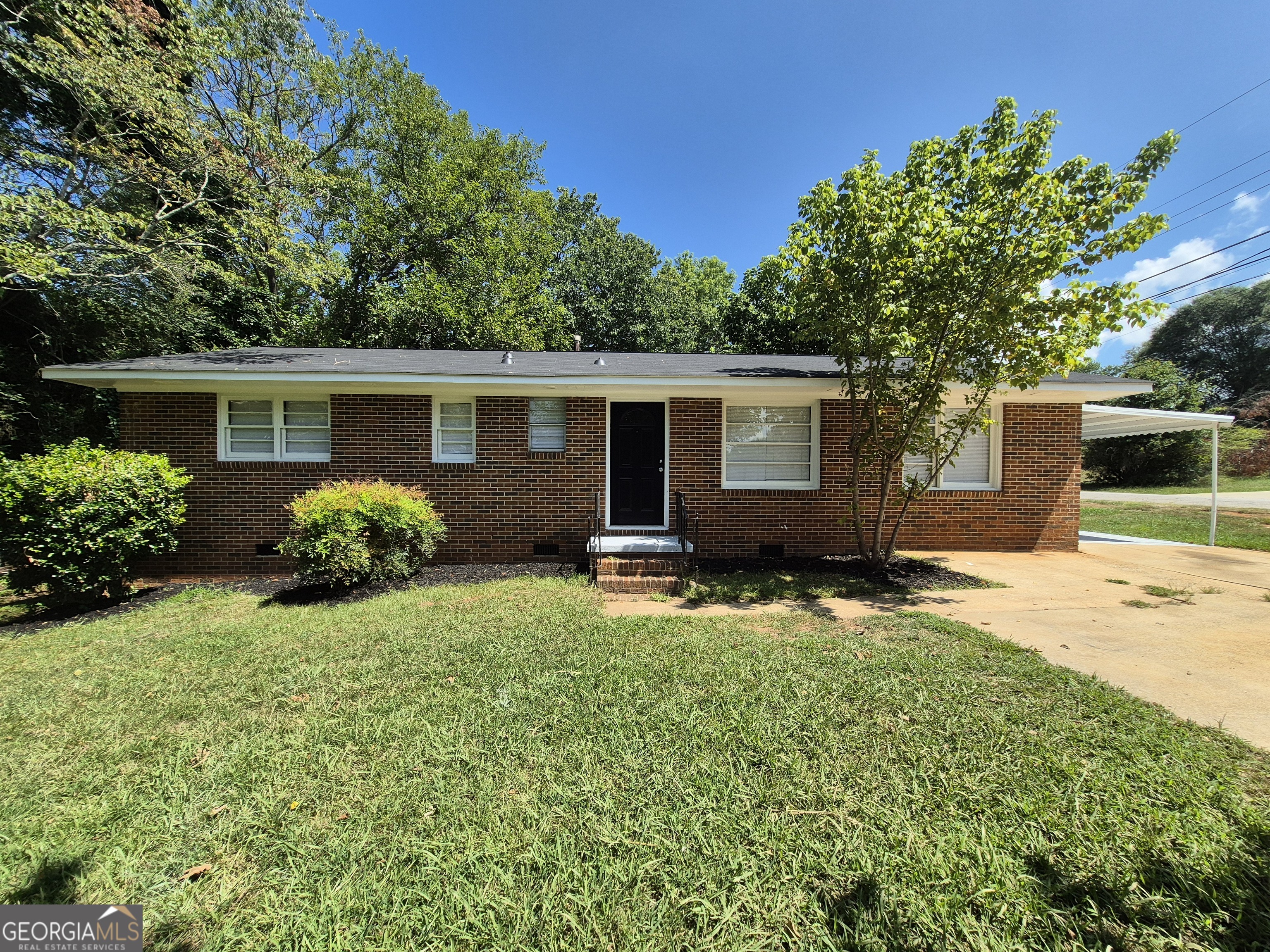 Classic Brick Ranch Just Minutes from UGA & Downtown Athens! Welcome to this charming 3-bedroom, 1.5-bath brick ranch located just a short drive from the University of Georgia campus and vibrant downtown Athens. This well-maintained home features 100% luxury vinyl plank (LVP) flooring throughout, combining style and durability for easy, low-maintenance living. The kitchen boasts new stainless steel appliances, including a microwave, and the home is topped with a new roof for added peace of mind. Enjoy a spacious, fully fenced backyard with chain-link fencing-ideal for pets or outdoor gatherings. Additional features include a carport and a circular driveway for convenient access and parking. Don't miss out on this gem!