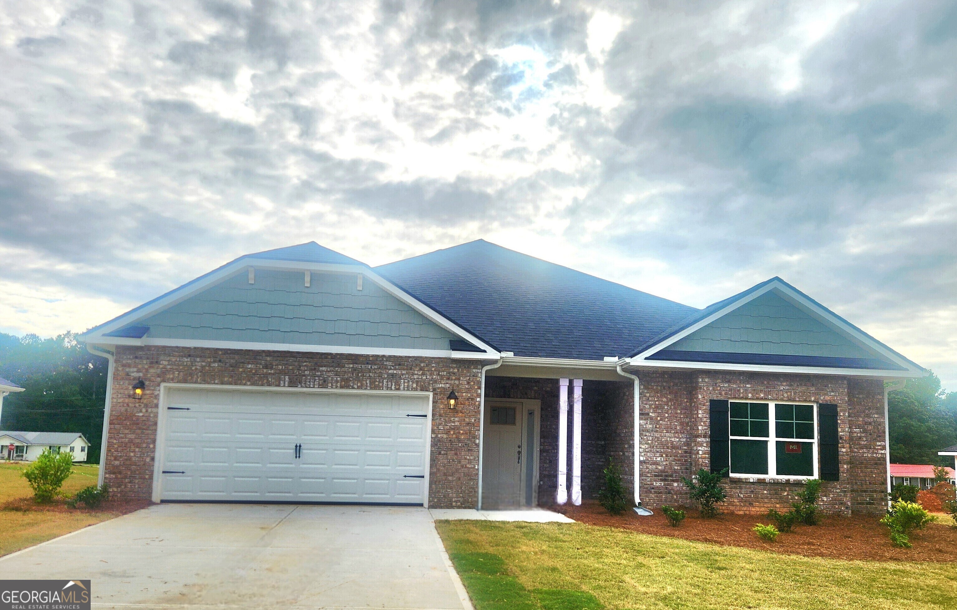 Welcome to this "Park Place Sanctuary" - A Classic and Cozy 4 Bedroom / 2 Bed - Ranch Retreat in the Park Place community! Envision waking up in your 1902 sq. ft. dream home in Park Place, affectionately known as "The Friendly City", Bowdon, GA. Designed to last and crafted with care, this home blends cozy nooks with open gathering spaces, inviting laughter, stories, and Sunday dinners. Natural light fills the walk-in foyer leading into the great open-concept family room, with a gorgeous granite countertop island awaiting your gourmet meal prep and a pantry just waiting to be filled. This beautiful split-bedroom layout offers 2 spacious secondary bedrooms and a full bath as you walk into the hallway. The amazing owner's suite has a luxurious soaking tub, a separate shower, and a walk-in closet. This thoughtfully designed space offers both privacy and connection, creating the perfect atmosphere for modern living. Home features 1 additional bedroom near the owner's suite, as it may be suitable for a nursery or study. Picture yourself unwinding on your covered lanai, overlooking a peaceful and spacious backyard for outdoor living and family barbeques. Whether hosting lively gatherings or enjoying a quiet evening, this home is designed to enhance every moment of your life. Built for quality and efficiency, "The Park Place Sanctuary" features architectural shingles for durability and two water heaters to ensure lasting comfort and peace of mind. you'll enjoy natural light throughout the day, making every room feel warm and inviting. Situated in Carroll County, minutes from I-20, local Bowdon schools, Tanner hospitals, and the University of West Georgia and West Georgia Technical College along Georgia State Routes 100 and 166, Bowdon combines small-town charm with convenient access to nearby communities, local downtown restaurants, and boutique shops. Near Carrollton Greenbelt walking trails, Little Tallapoosa, Hays Mills, and John Tanner Parks, great for outdoor life, hiking, biking, walking, boating, and fishing. USDA financing eligibility, and only $1,000 in earnest money required, making homeownership affordable and attainable. This is your opportunity to own a residence that perfectly blends style, efficiency, and affordability. Schedule your private tour today and start making memories in "Park Place Sanctuary."