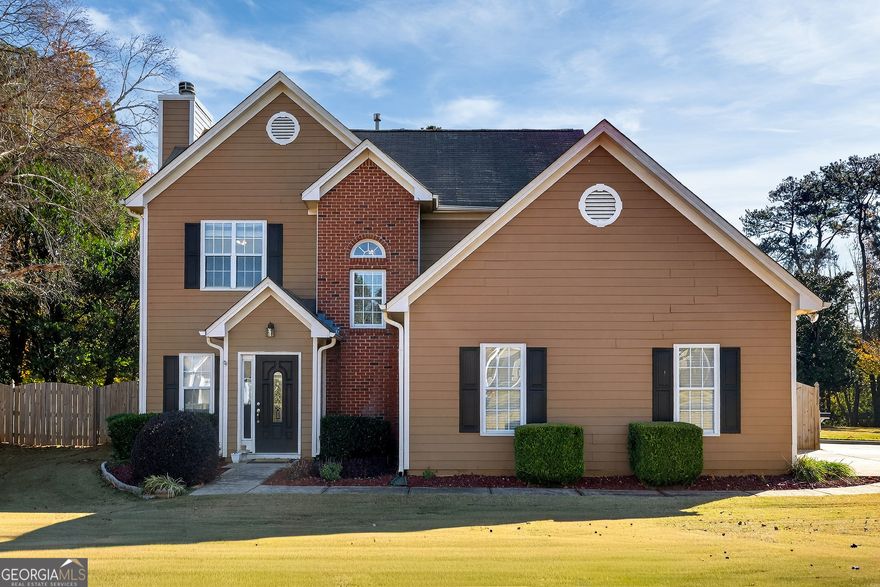 Discover your dream home at 2664 Reston Court in the highly sought-after English Oaks Swim/Tennis community. This beautifully updated residence is brilliantly positioned on an expansive corner, cul-de-sac lot , offering exceptional curb appeal, privacy, and ample parking with its oversized driveway and convenient side-entry garage. Step inside the bright two-story foyer to an inviting, recently repainted interior that is completely carpet-free with LVP flooring throughout, featuring a cozy fireplace in the living room. The updated, eat-in kitchen is a chef's delight with stainless steel appliances , a gas range, and crisp white cabinetry , seamlessly connecting to the dining and breakfast areas. The upper level includes a spacious owner's suite with a relaxing garden tub and dual vanities, along with two sizable secondary bedrooms. This home is designed for worry-free living, soon to feature a BRAND NEW ROOF, and already boasting a 2023 HVAC, and a 2020 water heater. Step outside to enjoy the private, fenced backyard and fantastic community amenities like a family-friendly swimming pool , picturesque tennis/pickleball courts , a vibrant playground, and a private access trail to the buzzing Swift Cantrell Park. Located less than a mile from Kennesaw Elementary School, and just minutes from I-75/I-575 and the Express Lane, as well as Downtown Acworth and Downtown Kennesaw, English Oaks is truly an amazing place to live, play, and call home.