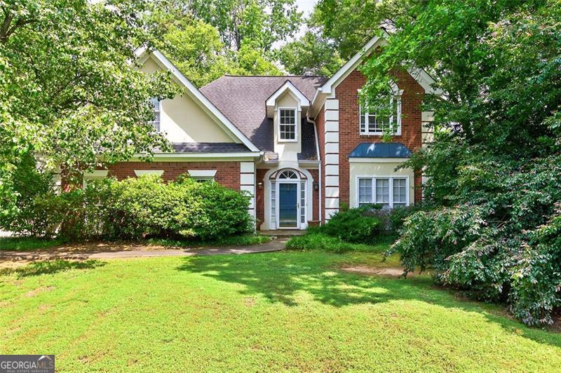 A Floor Plan You'll Fall in Love With - In the Heart of West Cobb & Hillgrove District! Welcome to one of the most beloved floor plans in one of West Cobb's most sought-after communities! This charming Craftsman-style cottage sits on a gorgeous corner cul-de-sac lot and is part of a vibrant neighborhood with a pool and active HOA - where neighbors feel like family and every day feels like home. Step inside and instantly feel the openness - soaring ceilings, a dramatic sunken family room, and a bright, flowing layout that's perfect for entertaining or everyday life. The spacious primary suite on the main level features a cozy fireplace, large walk-in closet, and peaceful privacy from the rest of the home. Upstairs you'll find huge secondary bedrooms, all with generous closets - room for everyone and then some! Out back? Get ready to be enchanted. The backyard is a hidden sanctuary with a Koi pond, lush greenery, and park-like charm. With just a little TLC, this space could be your outdoor dream oasis. Yes, this home could use some fresh paint and carpet - and the seller knows it! That's why we've priced it $50,000 BELOW market value to give the next lucky owner the chance to personalize and build instant equity. Located in the top-rated Hillgrove High School district, just minutes from parks, shopping, restaurants, Marietta Square, interstates, and more - plus churches, schools, and daycares all close by. This location is the total package. Side-entry garage, tons of privacy, beautiful neighbors, and a layout that just feels like home. This one is special. Truly. The sellers bought this home from me and have loved every minute in it - and now it's ready for its next chapter. Will that be you? Don't wait - opportunities like this don't come often in West Cobb!