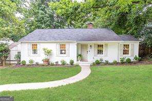 Renovated 1942 Bungalow in the heart of Loring Heights. This beautifully restored 3-bedroom, 2-bath jewel box is tucked into one of Atlanta's most desirable intown neighborhoods. Built in 1942 and thoughtfully renovated from top to bottom, the home blends timeless character with modern updates-perfect for today's lifestyle. The kitchen is a showstopper, featuring Carrera marble countertops, an apron-front sink, all-new appliances, and convenient in-kitchen laundry. From the kitchen is a private deck and a fully fenced, treelined backyard. Inside, the bright family room flows easily to a serene primary suite with updated bath, while a second full bath serves two additional bedrooms-both baths showcasing marble vanities and designer finishes. Extensive recent updates include a full exterior repaint, window reglazing, new gutters, fresh interior paint, and a newly installed cottage garden (May/June 2025). From 2022-2023, the home underwent a full kitchen renovation, HVAC replacement, primary bath remodel, addition of a second bath, and relocation of laundry from the basement. Neighborhood perks: Enjoy walkability to the neighborhood duck pond, playground, dog park, Tanyard Creek greenspace, and Loring Heights Park. Just minutes from the Northside Beltline, Bitsy Grant Tennis, Bobby Jones Golf Course, and some of Atlanta's best shopping and dining. Convenient to the Westside, Midtown, Buckhead, and downtown with quick access to interstates and Hartsfield-Jackson Airport. With roots as a 1940s steelworker enclave and a legacy crafted by renowned developer Edgar H. Sims, Sr., Loring Heights blends historic charm with unbeatable location-offering small neighborhood feel just steps from the city's energy.