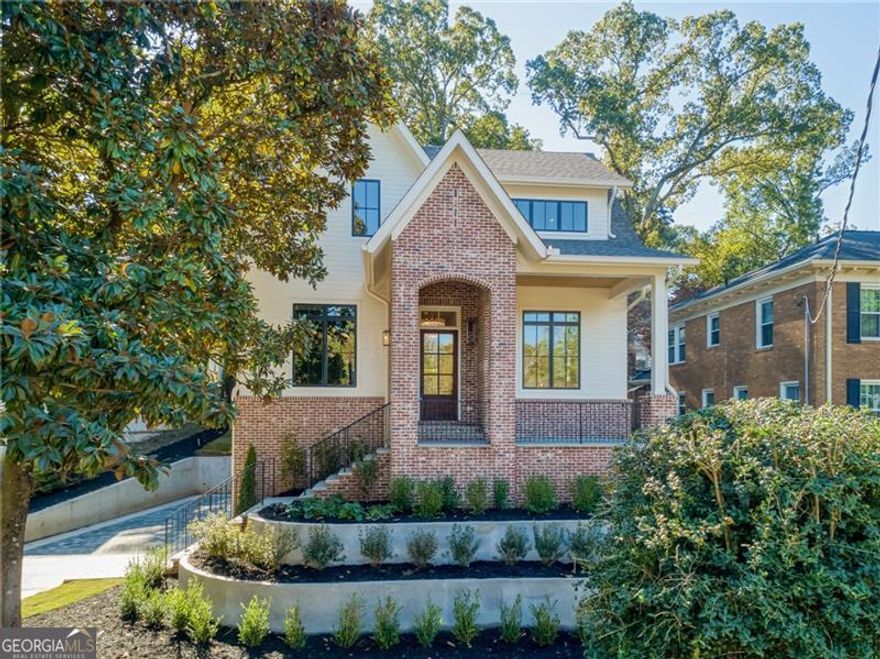 COMING SOON! Stunning new custom home in the heart of Morningside just steps to Piedmont Park and the Eastside Beltline Trail. Meticulously crafted by Field and Forge the 3-story home sits perfectly on one of the most grand and wide streets in the neighborhood. The curb appeal is designed to be both classic and striking - and it delivers. This 6-bedroom, 5 bath home combines generous light-filled spaces, thoughtful architecture and flow, carefully curated finishes, and a quality and attention to detail. Set on a big lot with a large private, backyard with a walled courtyard, a firepit area, and a huge level lawn with plenty of room to run and play and for a pool. Striking front windows and entrance create a bold statement and invite the light in. The home has both grand formal and cozy living spaces and the rooms flow seamlessly throughout the three floors. Main Level: Big covered front slate porch, entry foyer, beautifully paneled study. Stunning chef's kitchen with huge island, Thermador appliances, and separate scullery with wet bar and pantry. Huge great room with masonry fireplace and a wall of glass that opens out to the covered rear porch and private courtyard. Open dining room, bedroom suite or office.   Upper Level: Spacious primary suite with vaulted ceilings, a stunning owner's bath and huge custom closet. The wide and bright upper hall leads to three large secondary bedrooms with en-suite baths, big closets. The carefully considered laundry layout maximizes storage, light and counter space. Terrace Level: Oversized 2-car drive-under garage with easy driveway/turnaround area. Mudroom entry with coat closet. 6th private bedroom suite. Giant daylight recreation room with wet bar. 10' ceilings bring in the light. Plenty of storage. So much style and space in an unbeatable location.