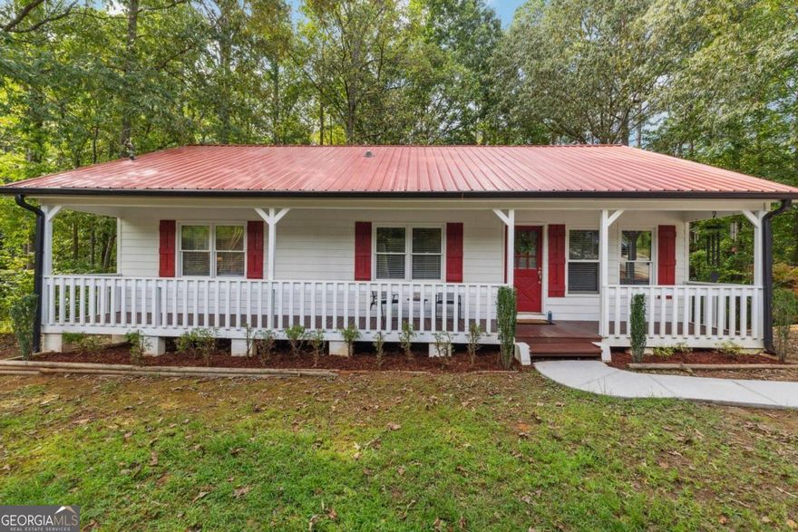 Welcome to this inviting ranch home, where charm and comfort meet! Nestled on a private lot, this home greets you with a spacious front porch, perfect for enjoying your morning coffee or winding down at the end of the day. Step inside to an open-concept living and dining area, seamlessly connected to the kitchen. This space provides easy access to a private deck overlooking a beautifully wooded backyard, ideal for relaxation and outdoor entertaining.    You'll find a convenient laundry room and pantry combination at the far end of the kitchen. The ownerCOs suite offers plenty of comfortable space, while two additional bedrooms and a full hallway bath provide extra room for family or guests.    The long driveway provides ample parking, and the tall crawlspace with a moisture barrier offers plenty of storage. The expansive backyard holds endless potential for gardening, playing, or simply enjoying nature. Located in a top-rated school district and close to plenty of shopping and dining options, this home delivers the best of both worldsCopeaceful living with convenience just around the corner.    DonCOt miss this perfect blend of cozy living, prime location, and outdoor charm. Schedule your tour today!