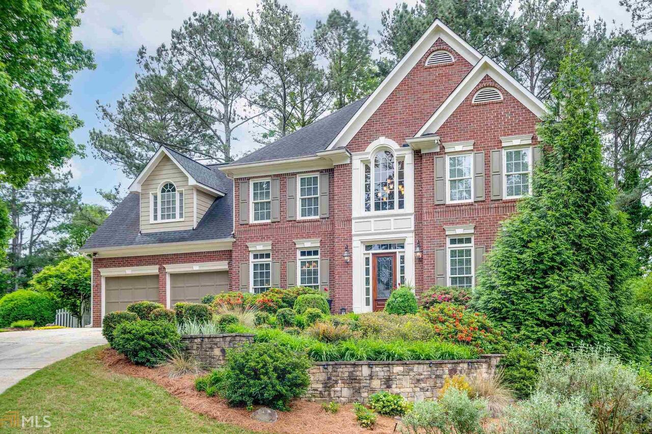 Johns Creek Stunner has been meticulously maintained by Original Owner.Gorgeous Updated All White Kitchen features top of the line Kitchen Aide Appliances, Granite/Tile Backsplash & Upgraded Fixtures and Lighting. Inviting Breakfast Room with Shiplap Walls. Southern Living Inspired Screened Porch over looks the most Gorgeous Backyard you will find! Slate Patio/Courtyard with Fountain/perfect for Entertaining. Fireside Family Room with Built-ins. Front & Rear Stairs lead to Owners Retreat with On-Suite. Great finished Terrace Level complete with Rec/Media Room/Home Office Space/Billiards room w/Built-in Bar and Full Bath. Private Culdesac Lot.