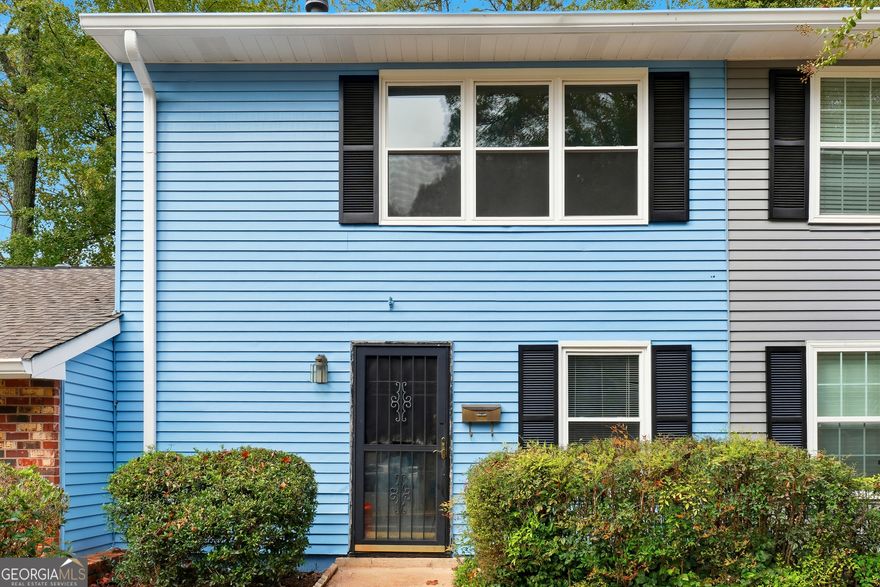 Welcome to an incredible opportunity in the heart of Marietta! This spacious 2-bedroom, 1.5-bath townhome in the quiet and established Hidden Creek community offers the perfect blank canvas for homeowners or investors looking to add their personal touch. With solid bones, great natural light, and a functional layout, this home is ready for your updates and design ideas. Step inside to a large open-concept living and dining area with sliding glass doors that lead to a wooded backyard-ideal for relaxing or entertaining. The kitchen features gas cooking, ample cabinet space, a tile backsplash, and a dedicated laundry nook with built-in shelving. Upstairs, you'll find two generously sized bedrooms and a full bath. Outside, enjoy low-maintenance living with assigned parking right in front of the home and a welcoming community setting surrounded by mature trees. Located minutes from Marietta Square, Kennesaw Mountain, shopping, restaurants, parks, and major highways, this home offers unbeatable convenience in a rapidly growing area. Perfect for homeowners wanting affordability in West Cobb, or investors seeking a strong rental location as the cap HAS NOT been met.