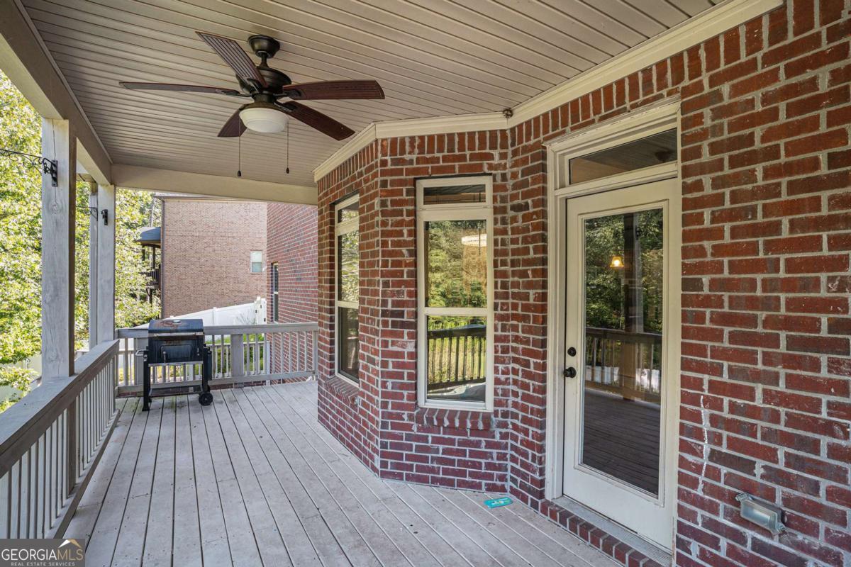 Seller is willing to assist with buying down your interest rate with a strong offer-making this the perfect opportunity to own in one of Locust Grove's most sought-after gated communities with 24-hour gate guard security. This impressive 7-bedroom, 4-bath home boasts a fully finished basement, providing additional living space ideal for entertainment, guests, or a private retreat. The expansive main level features open living areas filled with natural light, a modern kitchen with abundant counter space, and inviting dining options. Upstairs, the oversized master suite is a true getaway, showcasing a panoramic view of the property, spa-like bath, and spacious walk-in closet. With generous secondary bedrooms, a private backyard, and unmatched community amenities, this home is the complete package. Schedule your private tour today!