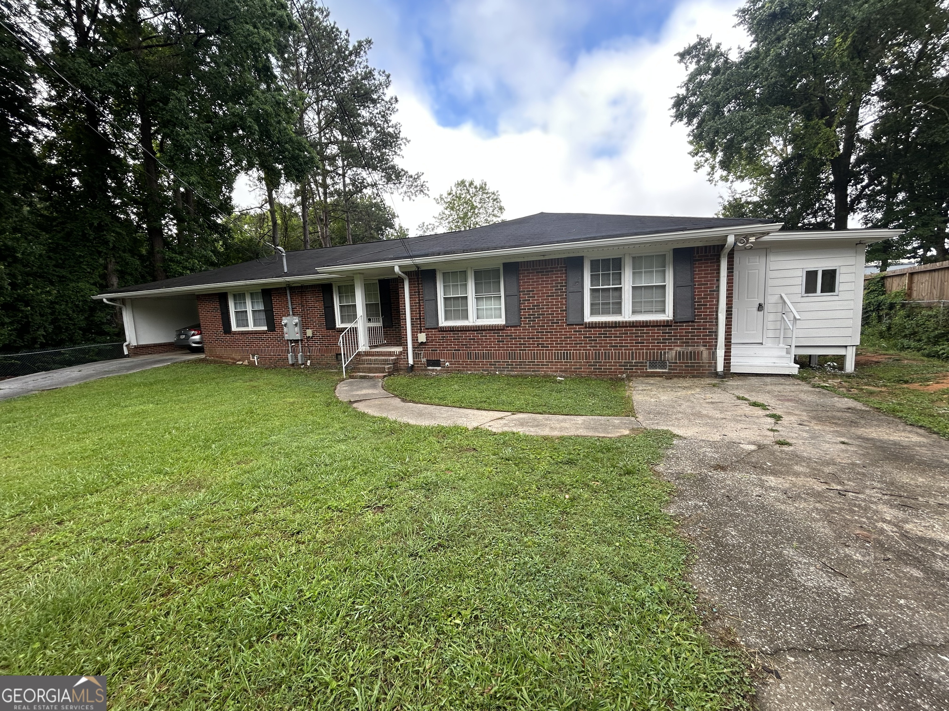Don't miss this solid brick duplex featuring a desirable Single-level 2 bed / 1 bath floor plan with generously sized rooms, abundant kitchen counter space, large windows, ceiling fans, and washer/dryer hookups. Underway is New Kitchen, Interior Paint, Refreshed Lighting, New Appliances, Refreshed Landscaping. Move in Ready Now! Conveniently located near the Silver Comet Trail for walking and biking. Just minutes from major retailers like Home Depot and Wal-Mart, plus restaurants and shopping centers. Easy access to I-285 and I-20 makes for a quick 20-minute commute to downtown Atlanta.