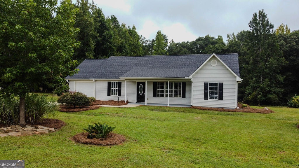 Photo of 156 Whispering Pines Trail, Milner, GA 30257 (MLS # 10880516)