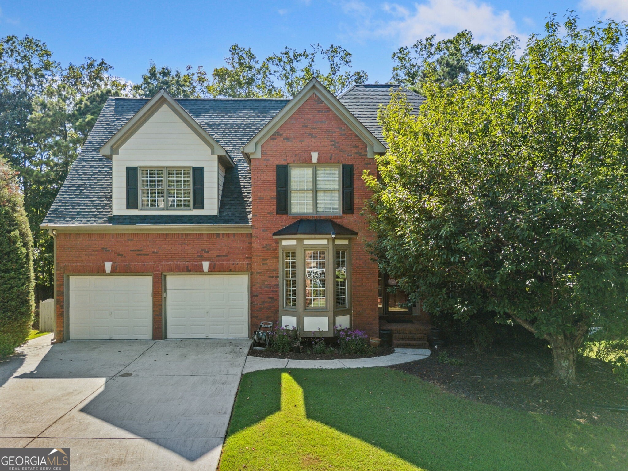 Welcome to this exceptional executive residence offering the perfect blend of luxury, space, and functionality. Boasting seven spacious bedrooms and four and a half beautifully appointed bathrooms, this home is designed to accommodate both large families and high-end entertaining. From the moment you step inside, you're greeted by an elegant floor plan featuring custom finishes, high ceilings, and abundant natural light. The gourmet kitchen on the main level is a chef's dream, complete with premium appliances, granite countertops, and an oversized island, ideal for gatherings. A second full kitchen on the lower level provides added convenience, perfect for multi-generational living or hosting extended guests. The fully finished basement expands the living space dramatically, offering additional bedrooms, a recreation area, and private guest quarters. Whether used for a home theater, gym, or executive office suite, this lower level is both versatile and luxurious. Each bedroom is generously sized, with the primary suite serving as a private retreat featuring a spa-like en-suite bath, fireplace and walk-in closet. Multiple living areas throughout the home provide ample space for relaxation and entertainment. Outside, enjoy a professionally landscaped yard, ample parking, and a serene setting that reflects both prestige and comfort. This executive home delivers sophistication, space, and style -- ready to meet the needs of today's discerning homeowner.