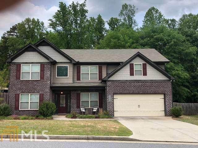 SELLER TRANSFERRED!!! OFFERED BY ORIGINAL OWNER. HARD TO FIND IN FAST GROWING FORSYTH COUNTY, SPACIOUS 5/3 WITH FORMAL LIVING ROOM, DINING AND MEDIA ROOM WITH OPEN FLOOR PLAN. KITCHEN FEATURES, GRANITE COUNTERTOPS, STAINLESS APPLIANCES, WALK-IN PANTRY AND VIEW TO GREAT ROOM. THE 2-STORY FOYER IS A WARM INVITE TO MUCH DESIRED FLOOR PLAN FOR THE GROWING FAMILY.THE OVERSIZED MASTER BEDROOM ON SECOND FLOOR HAS SPACIOUS WALK-IN CLOSET, SEP. SHOWER AND SOAKING TUB WITH DOUBLE VANITY. DON'T FORGET THE LARGE MEDIA ROOM WITH UNLIMITED POTENTIAL. LOCATED IN MUCH SOUGHT AFTER SILVER CITY AND NORTH FORSYTHIA SCHOOL AREA. JUST MIN. FROM GA. 400, SHOPPING, AND NORTH GEORGIA PREMIUM OUTLET MALL.