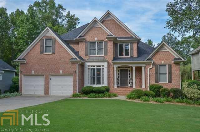 YOU WILL LOVE this Absolutely pristine, Brick front home with fabulous, private golf course view on the 3rd hole of Trophy Club Golf Course; beautifully landscaped. Newly refinished gorgeous HDWDS on main level! Must see built-in office in bsmt! Master Bdrm on main. Huge new tile shower. ALL bdrms w/walk-in closets! Kit w/stainless, Corian, Bosch DW & micro. 6 mo., Double Oven Stainless Range. Architectural Shingle Roof! 2 Decks! 3 sep HVAC's w/Allergy filters, hdwd steps to fin bsmt. This rare, very special home, will not last! SEE ASAP!!!