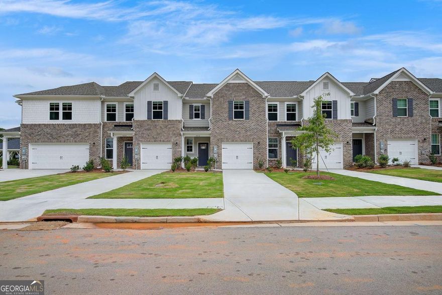 Welcome to Avery Landing by DRB Homes - your new home in the highly sought-after McDonough area! This beautifully crafted single-family townhome combines style and functionality, with no detail overlooked. The spacious Braden floor plan offers 3 bedrooms, 2.5 bathrooms, and an open-concept main level perfect for modern living and entertaining. The gourmet kitchen is a true showstopper, featuring a large island with quartz countertops, stylish painted cabinetry, and a generous pantry for storage. Upstairs, the inviting owner's suite includes a sizable walk-in closet, dual vanities, and a sleek tile shower. Enjoy the convenience of included stainless steel appliances-side-by-side refrigerator, range, microwave, dishwasher-plus a washer and dryer. Additional highlights include a one-car garage with opener and a private patio-ideal for outdoor relaxation. Avery Landing offers the perfect blend of comfort, design, and convenience. Schedule your tour today!     Please note: If the buyer is represented by a broker/agent, DRB REQUIRES the buyer's broker/agent to be present during the initial meeting with DRB's sales personnel to ensure proper representation.