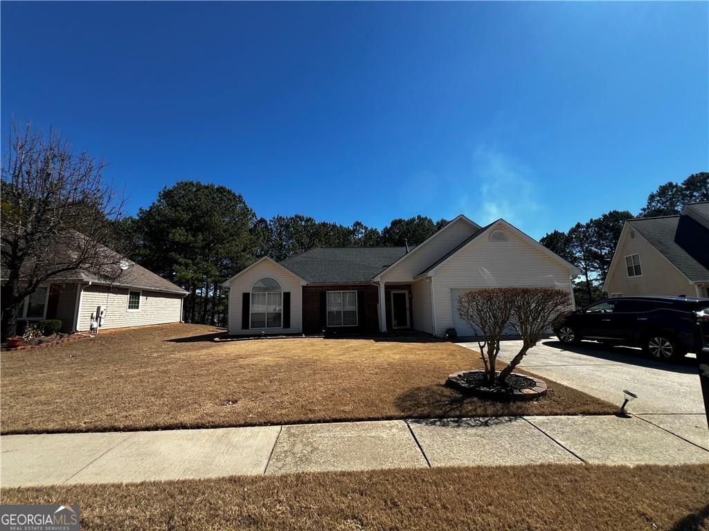 Photo of 12012 Red Ivy Lane, Fayetteville, GA 30215 (MLS # 10790001)