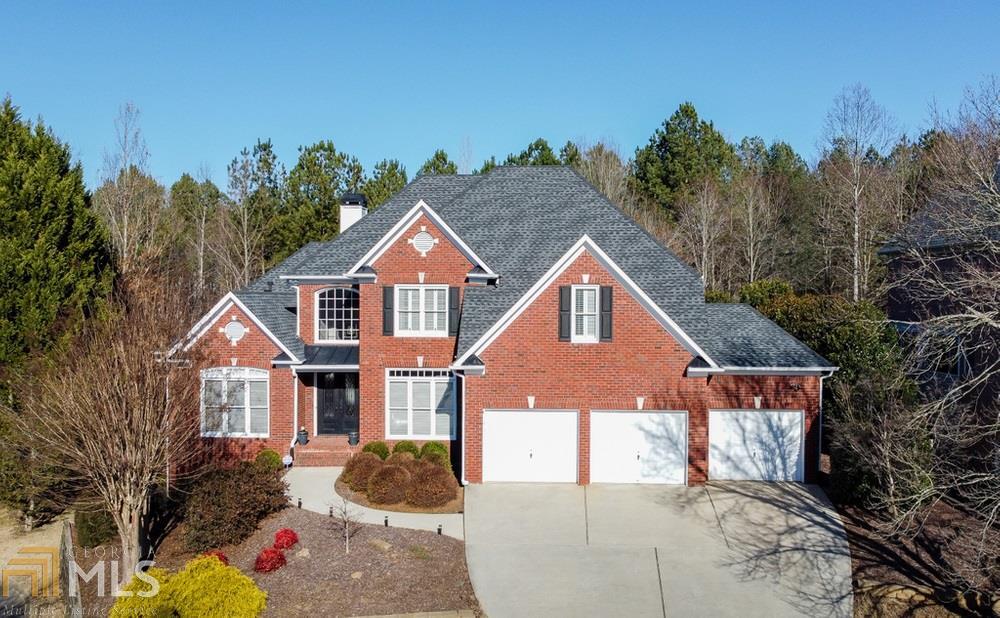Beautiful John Wieland brick home with lots of natural light and a seamless flow throughout. First floor features hardwood floors throughout; two story foyer; separate living room/office; dining room; huge great room with a wall of windows, built in book shelves, marble fireplace; oversized kitchen with granite countertops, tile backsplash and stainless-steel appliances; plus master on main with dual walk-in closets and a large spa-like bath. Private deck overlooking your park-like fenced backyard. Upstairs you will find two bedrooms adjoining a jack and jill bath, plus another spacious bedroom with a private bath. The terrace level features a large media room with wet bar, two more bedrooms, full bath, plus a spacious office/playroom/workout room; and a workshop. Loads of storage space available, multiple home office options, and a 3-car garage. Convenient location within walking distance to Pinckneyville Park and its trails. The Forum and the new Peachtree Corners Town Center with multiple dining and shopping options are nearby. Plus, Historic Norcross with all its charm is just minutes away. Award winning Gwinnett County Schools including the new Coleman Middle School-Georgia and Gwinnett's First Certified STEAM Middle School.