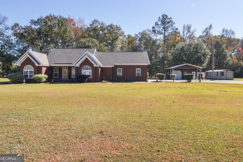 Photo of 883 Zittrouer Road, Guyton, GA 31312 (MLS # 10650135)