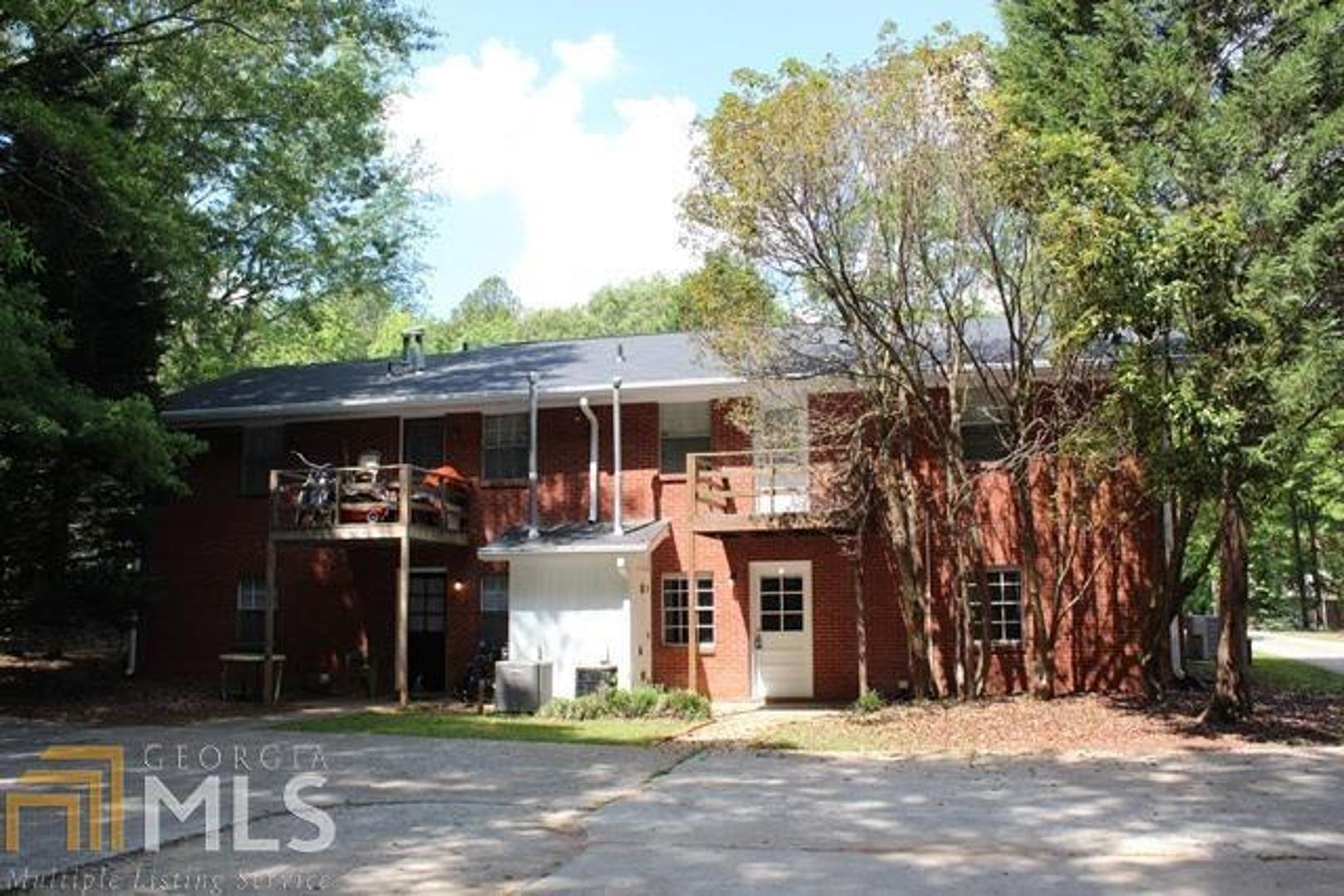 Beautiful Brick 2 Bedroom / 1 Bathroom Townhome in Fayetteville! This 2 Bedroom / 1 Bathroom Townhome has plenty of lovely features! The brick abode features Wood Floors throughout, Spacious Living & Dining Room, and Beautiful Kitchen with Appliances. This home is situated in a pretty wooded area, and is convenient to Downtown Fayetteville! Schedule a showing today at ALL3REALTY.com!!! Your rent now includes our exciting new benefit package, which gives you regular HVAC filter replacement delivery, renters insurance, & many other great benefits that are all included in the listing rate! Please check our website for more details at All3Realty.com, under the RESIDENTS tab, RESIDENT BENEFIT PACKAGE.