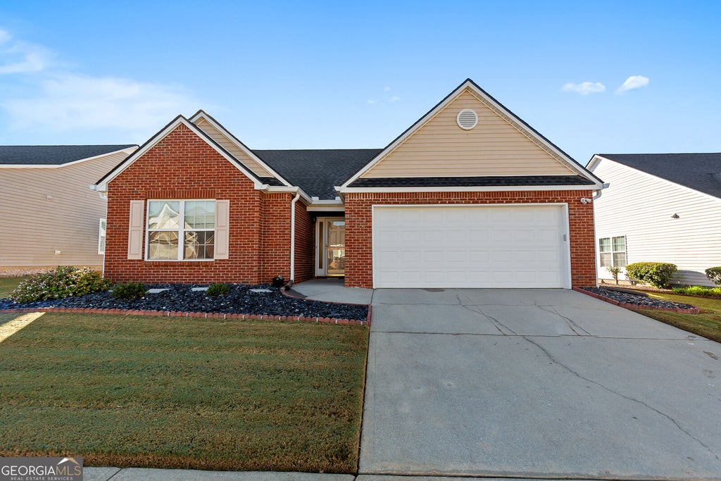 Photo of 709 Village Lane, Loganville, GA 30052 (MLS # 10882230)
