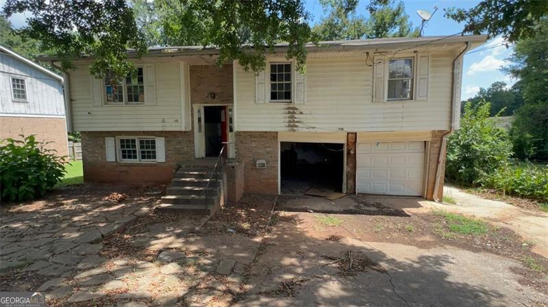Exciting Investment Opportunity in Decatur! This 4-bedroom, 2.5-bathroom split-level home is ideal for the savvy investor or experienced flipper looking to unlock its full potential. With ample space and a versatile layout, this property is ready for transformation.