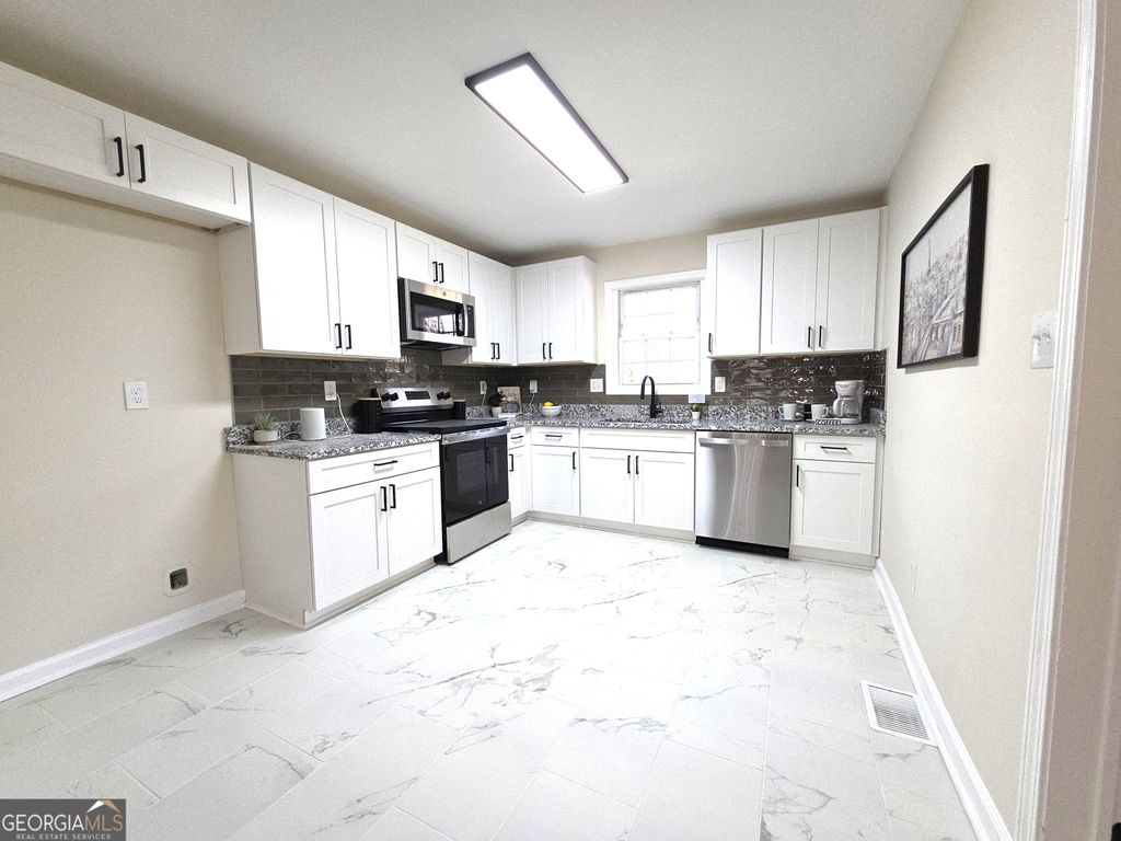 Photo of 1576 S Gordon Road, Austell, GA 30168 (MLS # 10672291)