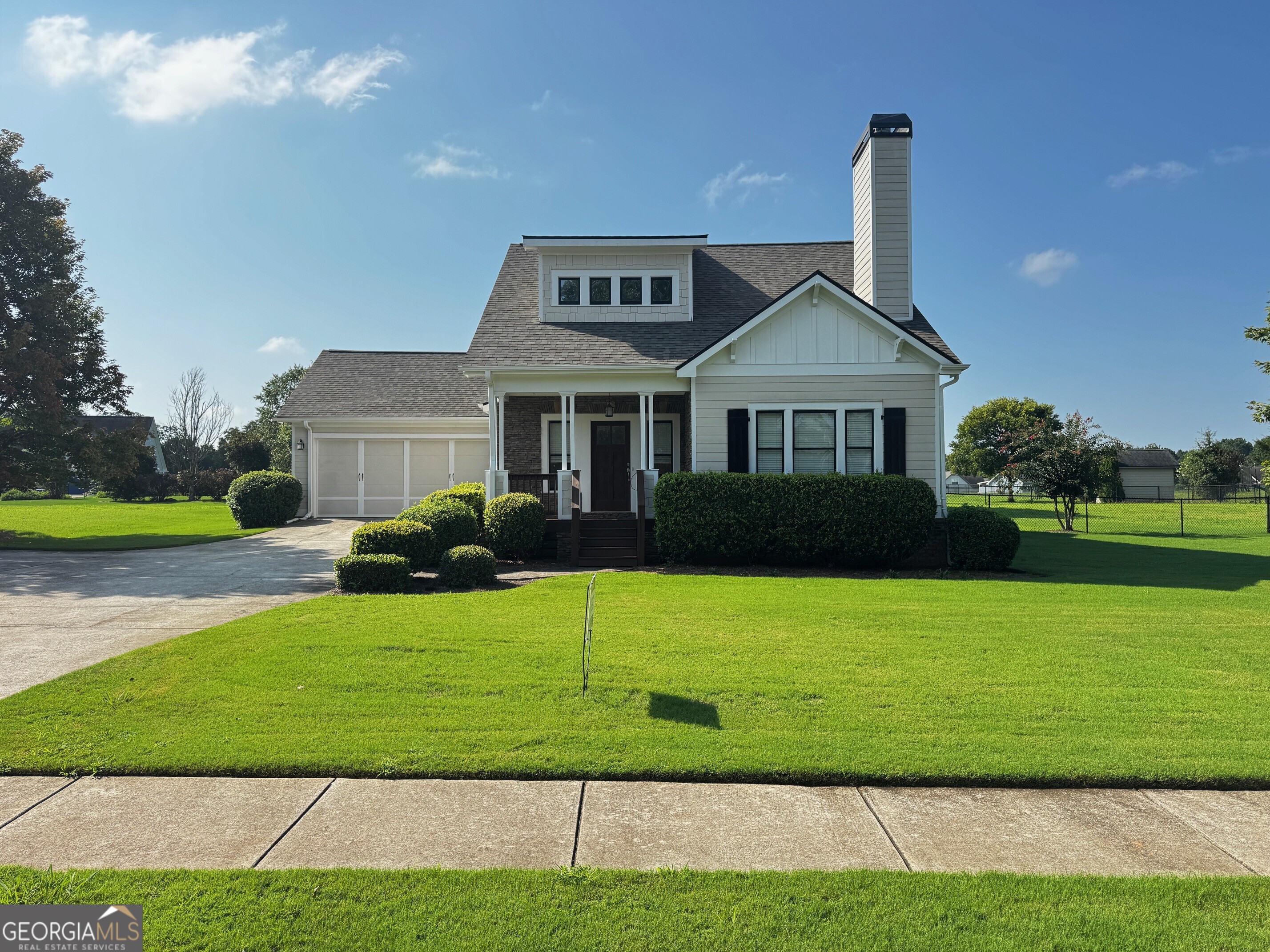 Beautiful home in a quiet neighborhood. All homes are on large lots, giving everyone space! Large level lot .84 of an acre. The Backyard is fenced! Hardwood floors on the main level, except for the master on the main has carpet. Family Room with Fireplace, Open eat-in kitchen with stained cabinets and granite countertops with stainless steel appliances, Separate Dining Room. Upstairs there a 3 nice-sized bedrooms with a Full bath with double vanity and a privacy door for the shower area. The garage is very nice size to hold 2 vehicles (2 pick-ups) and the mower and some tools, 8' door for taller vehicles. Oconee County Schools.
