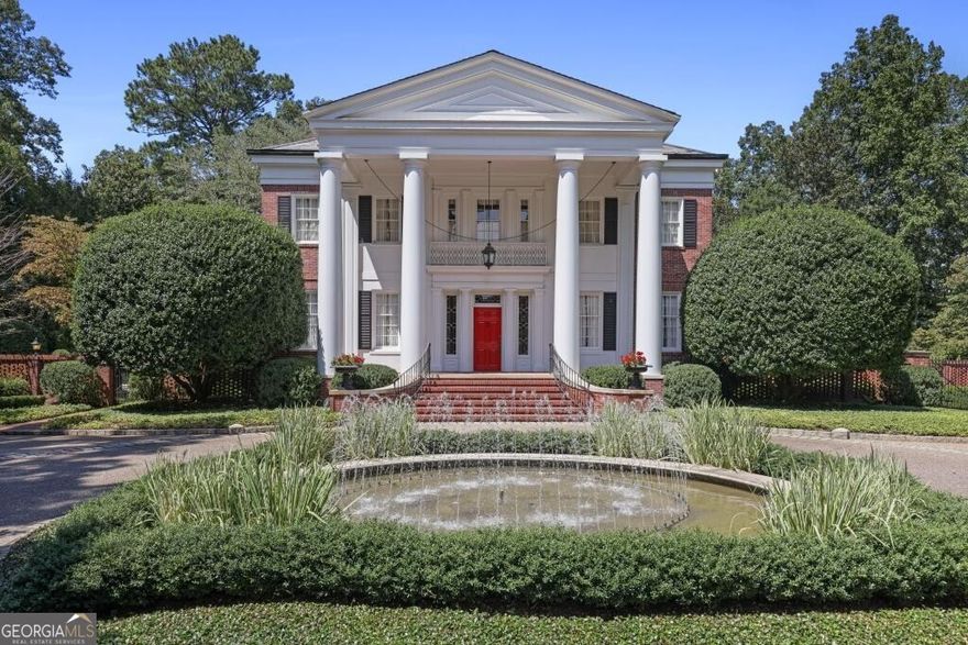 Built in the late 1930's, Magnolia Hill is one of the few remaining properties with 12.5 acres of beautifully manicured gardens surrounded by woodlands in the middle of Buckhead. The first introduction to this amazing property is the long private driveway entrance, lined by mature magnolia trees, and gracefully leading toward a circular fountain in the foreground of the stately Southern-style home. The house with its grand foyer, high ceilings, three fireplaces, hard wood floors, and graciously classic living spaces is immaculate and a welcoming place to call home. The property offers a fully finished terrace level with its own bedroom and kitchen; a totally livable guest house, with 2 bedrooms and a kitchen, overlooking the large rectangular pool and jacuzzi; a tennis court; a two-car garage with an apartment below; and an original "barn" ideal for an indoor children's play space.  Conveniently located near Atlanta's public and private schools and close to 75/85 for easy access to all areas of the city, this lovely estate property is a must-see for discriminating buyers seeking unparalleled privacy, beauty, and solitude.