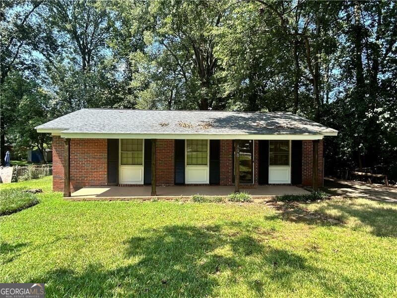 Welcome to 898 Verona Drive-a beautifully renovated 4-sided brick ranch that blends timeless charm with modern updates. This 2-bedroom, 1-bathroom home has been thoughtfully redesigned with fresh, contemporary finishes throughout, making it completely move-in ready. Step inside to discover all-new flooring and a stunning brand-new kitchen featuring crisp white cabinetry, sleek stainless-steel appliances, and stylish fixtures. The updated bathroom adds to the home's fresh appeal, while the finished laundry room and mudroom provide functional convenience and extra storage. The oversized primary bedroom offers exceptional space and flexibility-it was originally two separate bedrooms and can easily be converted back, giving you a potential third bedroom to suit your needs. Situated on a quiet street in an established neighborhood, this home is perfect for first-time buyers, downsizers, or investors looking for quality and location. With solid brick construction and all the major updates done, 898 Verona Drive is a smart, stylish choice in Clarkston. Just minutes to downtown Clarkston, local parks, and easy access to I-285. Schedule your showing today and see the value for yourself-this one won't last long!