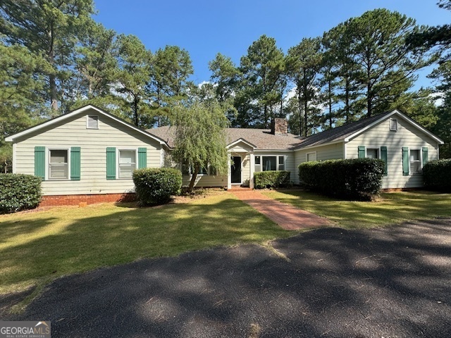 Spacious home located in Planters Ridge Subdivision. This lovely home has 4 bedrooms, 2 Full baths and a half bath. Tons of built-ins - cabinets, shelving, and extras. Home sits in a cul-de-sac. Minutes from West Point Lake, Highland Marina, and downtown Lagrange. This home features a cozy kitchen with a large window that overlooks the yard (includes refrigerator, built in stove, oven, microwave, etc), decorative fireplaces, a large living room, separate dining area, master bath (that includes a Jacuzzi tub and separate shower), laundry room (with utility sink and storage), car port, and a private outdoor space to wind down and relax for a while. This is a must see! Minimum credit score of 625 required. Utilities: Diverse Power / City of LaGrange Schools: Long Cane Elem/Long Cane Middle/ Troup County High