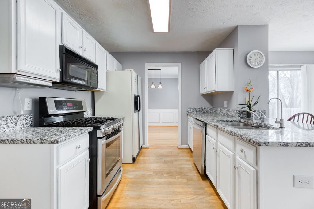 Photo of 3015 Dominion Walk Lane, Snellville, GA 30078 (MLS # 10682696)