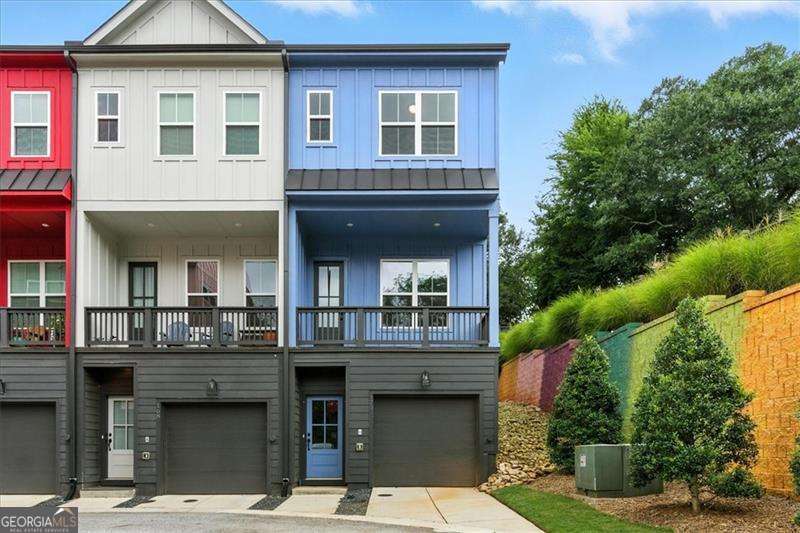 Picture perfect 2 bed, 2 bath end-unit townhome in the sought after Paintbox community, nestled in the heart of vibrant Kirkwood! Enjoy an open concept kitchen and living space filled with natural light, perfect for entertaining or relaxing. The kitchen features stainless steel appliances, quartz countertops, and sleek cabinetry. Step out onto your covered deck or relax on the charming patio. Both bedrooms are well-sized, with generous closet space and ensuite baths. The home also includes a 2-car tandem garage, plus a washer and dryer for added convenience. Located in the colorful, design forward Paintbox community, residents enjoy access to a community garden and dog park, all just minutes from East Atlanta Village, Kirkwood Village, the BeltLine, Pullman Yards, and some of Atlanta's best restaurants, shops, and entertainment.