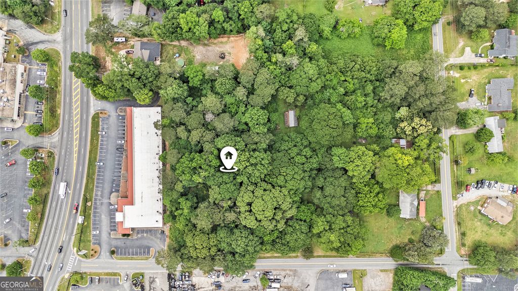 Photo of 7441 McElroy Drive, Riverdale, GA 30296 (MLS # 10686760)