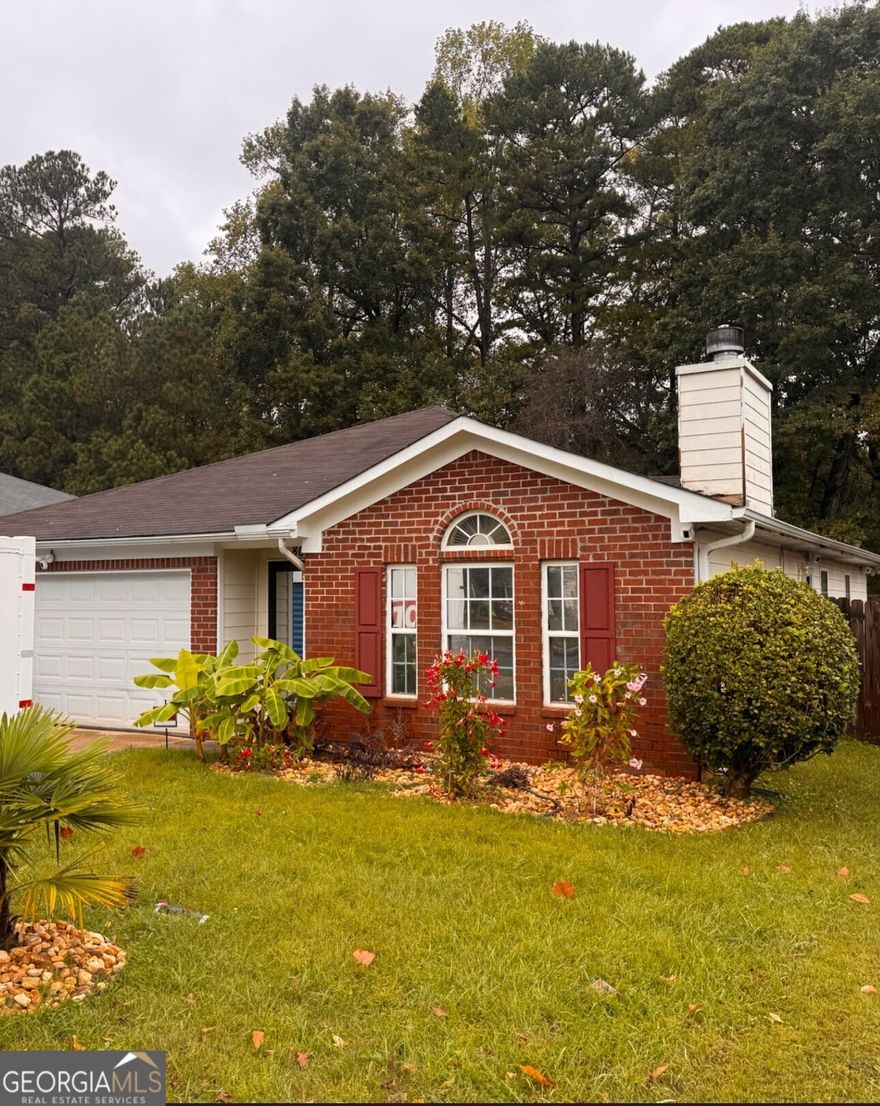 Well-maintained 3-bedroom, 2-bath home featuring an open family room with fireplace, separate dining area, and a spacious kitchen with plenty of cabinet and counter space. The large primary suite includes a walk-in closet, oversized vanity, garden tub, and separate shower. Two additional bedrooms share a functional hall bath.    Enjoy a privacy-fenced backyard with peaceful views. Home also offers a 2-car garage.    Located in a swim/tennis community with a pool, playground, tennis and basketball courts, pavilion, and lake access. Conveniently situated between Conyers and Covington with easy access to I-20, shopping, and dining.