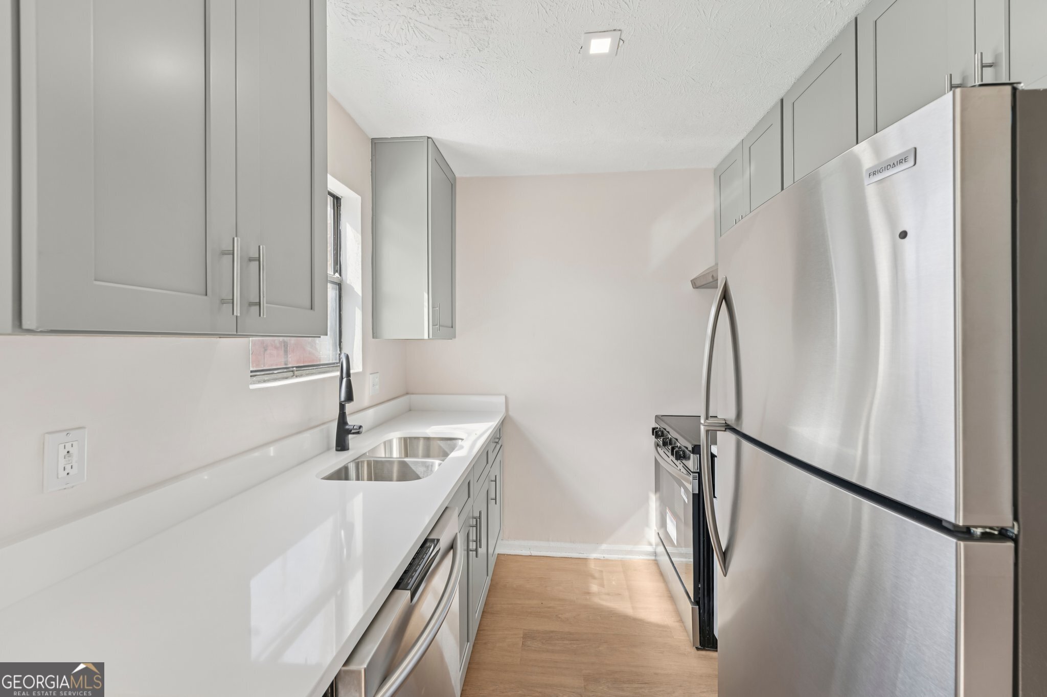 Welcome to 1103 Magical Way in the heart of Sugar Hill. This fully renovated townhome is move-in ready with brand new flooring, quartz countertops, modern bathrooms with new vanities, and all-new appliances. Every space has been thoughtfully updated for a fresh, modern look and a low-maintenance lifestyle. For those looking to make this their home, you'll enjoy a bright, open layout with stylish finishes and the convenience of nearby shopping, dining, and top-rated schools including Sugar Hill Elementary, Lanier Middle, and Lanier High. The community offers HOA-maintained exteriors and grounds, making it easy to enjoy your new home without the hassle. For investors, this townhome also presents an excellent rental opportunity. With its updated features, desirable location, and strong school district, it is well-positioned to attract quality tenants and generate reliable income. Whether you're searching for your own place or a smart investment, 1103 Magical Way delivers the best of both worlds.