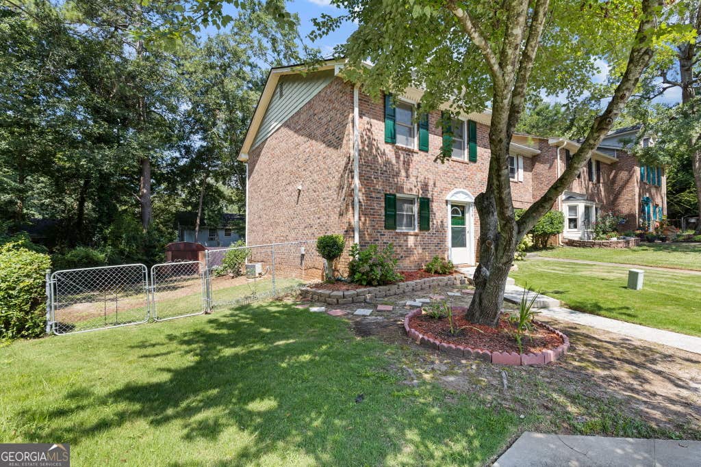 Photo of 5278 Oakridge Drive, Stone Mountain, GA 30083 (MLS # 10826188)