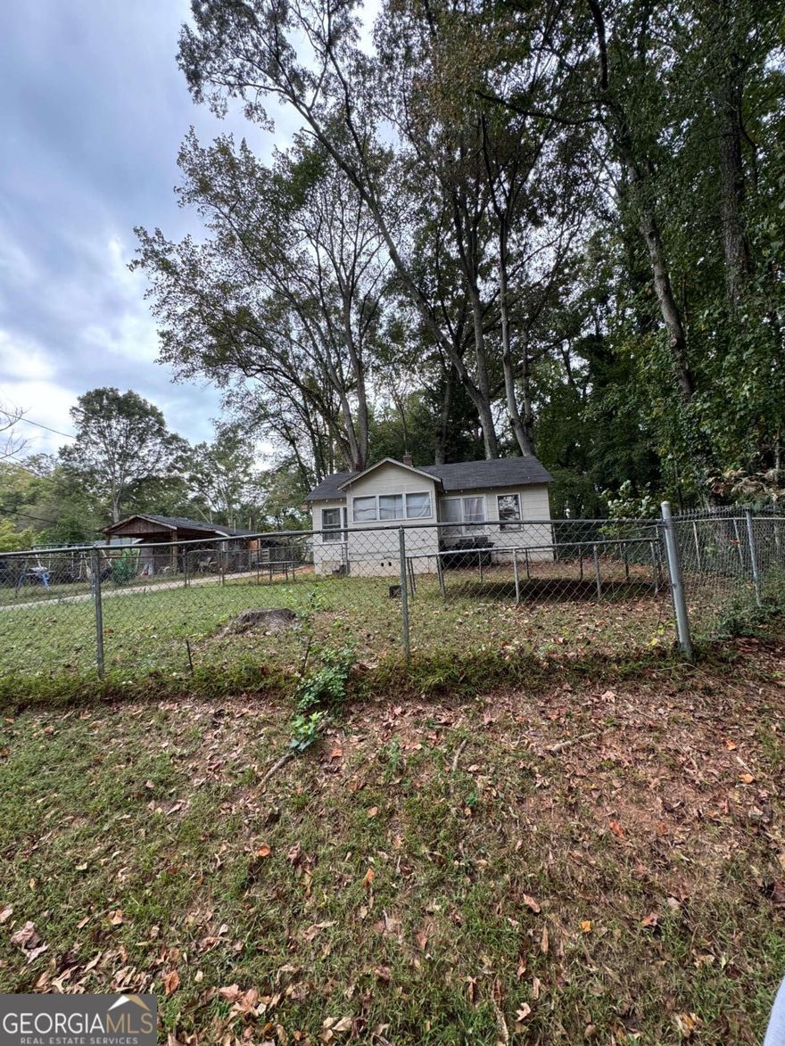 Investor Special Prime Marietta Redevelopment Opportunity. Attention all investors, builders, and developers this is your chance to secure a high potential property in the rapidly appreciating Marietta market! Whether you're planning to tear down and build new or take on a full-scale renovation, this lot offers the perfect foundation for your next profitable project. New construction homes in the area are selling in the mid-$500Ks to $600Ks, creating an incredible opportunity to capitalize on strong resale values and steady market demand. The property sits in a desirable location with convenient access to major highways, schools, and local amenities ideal for redevelopment or a new build community. There are multiple properties on this street, each sitting on generous lots that can be subdivided and sold individually. In total, five properties are available side-by-side, offering buyers the rare opportunity to control an entire stretch for redevelopment or to build multiple new homes. Whether you're building your next spec home, buy and hold portfolio, or small subdivision this is your moment.   Endless potential. Prime location. Strong upside. Contact us today to schedule a site visit or to inquire about the full 5-property package opportunity before it's gone!