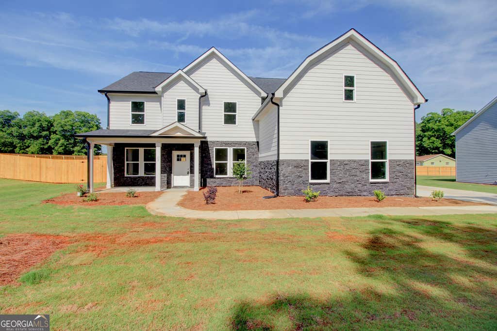 Photo of 23 Woodland Road, Covington, GA 30016 (MLS # 10831023)